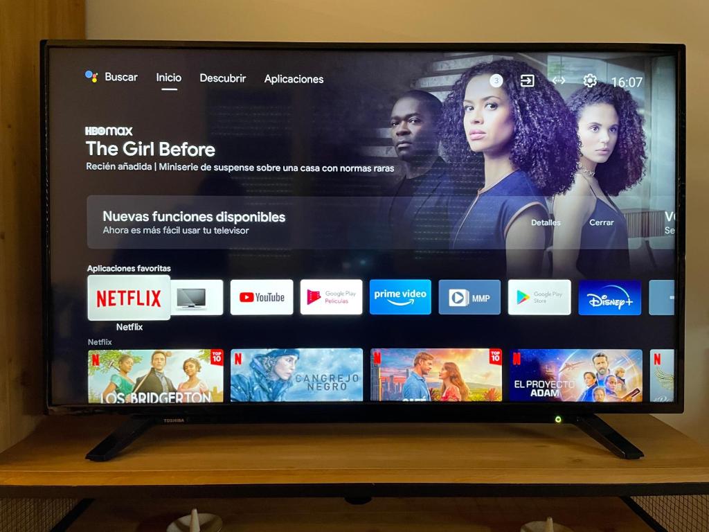 A television and/or entertainment centre at Gran Bilbao XI with parking by Aston Rentals