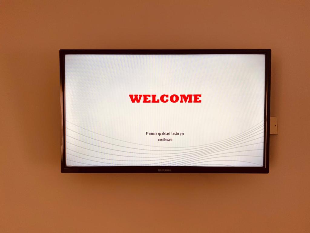 TV a/nebo společenská místnost v ubytování Hotel Damma's, Dipendenza Zamagna