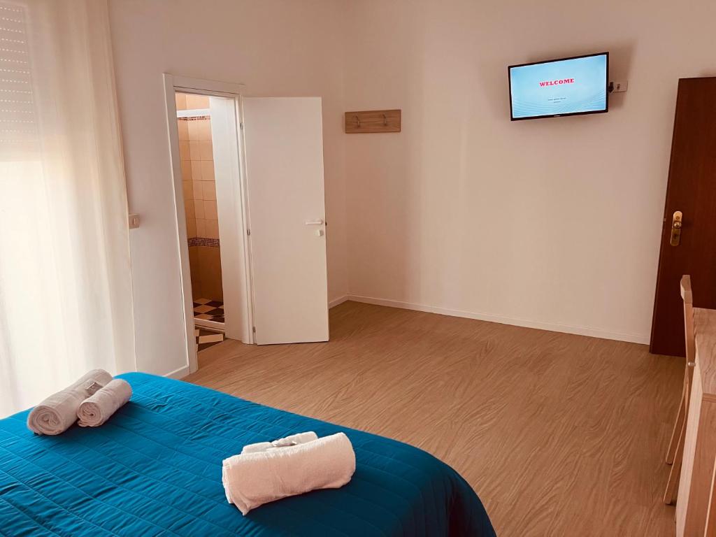 Postel nebo postele na pokoji v ubytování Hotel Damma's, Dipendenza Zamagna