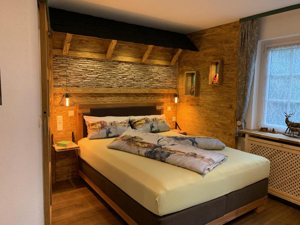 מיטה או מיטות בחדר ב-Haus Sonneck