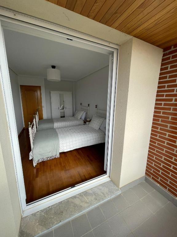 Posteľ alebo postele v izbe v ubytovaní KEY HOUSE