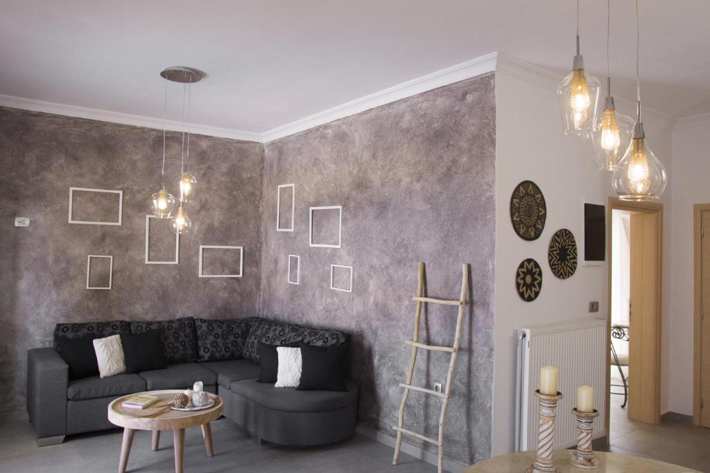 Posezení v ubytování PITHOS MODERN APARTMENTS