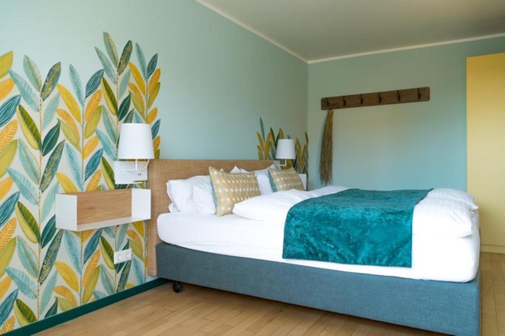 Postel nebo postele na pokoji v ubytování Hotel Viva Sky