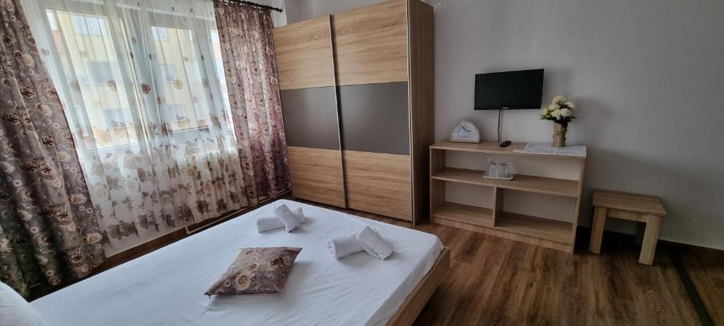 Postel nebo postele na pokoji v ubytování Hotel Dacor