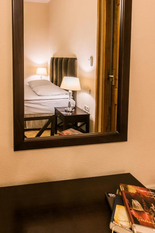 Postel nebo postele na pokoji v ubytování Hotel VIP