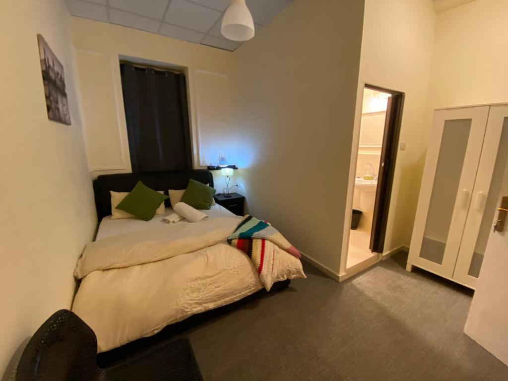 Postel nebo postele na pokoji v ubytování City Citadel Hotel,Amman