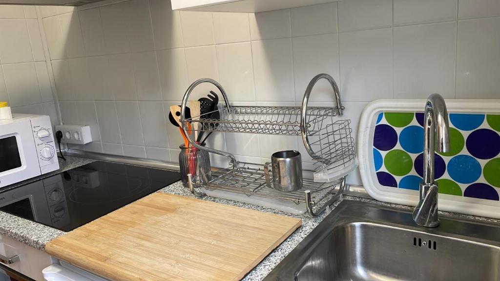 Kuchyň nebo kuchyňský kout v ubytování Casa da Fontiña