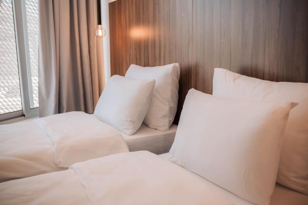 Postel nebo postele na pokoji v ubytování Hotel Carpe Diem