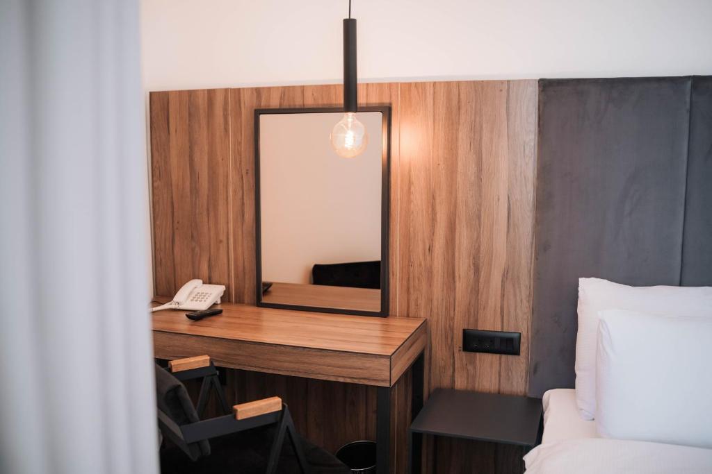 Postel nebo postele na pokoji v ubytování Hotel Carpe Diem