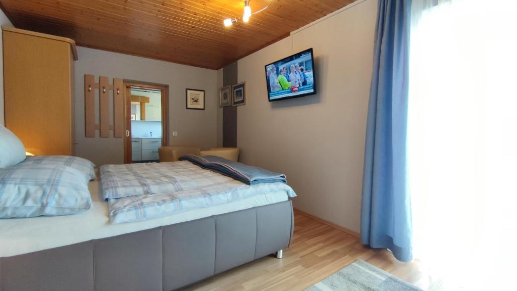 Postel nebo postele na pokoji v ubytování Ferienparadies Gutounik