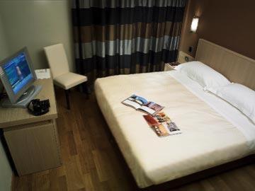 Postel nebo postele na pokoji v ubytování Hotel Dei Vicari