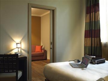 Postel nebo postele na pokoji v ubytování Hotel Dei Vicari