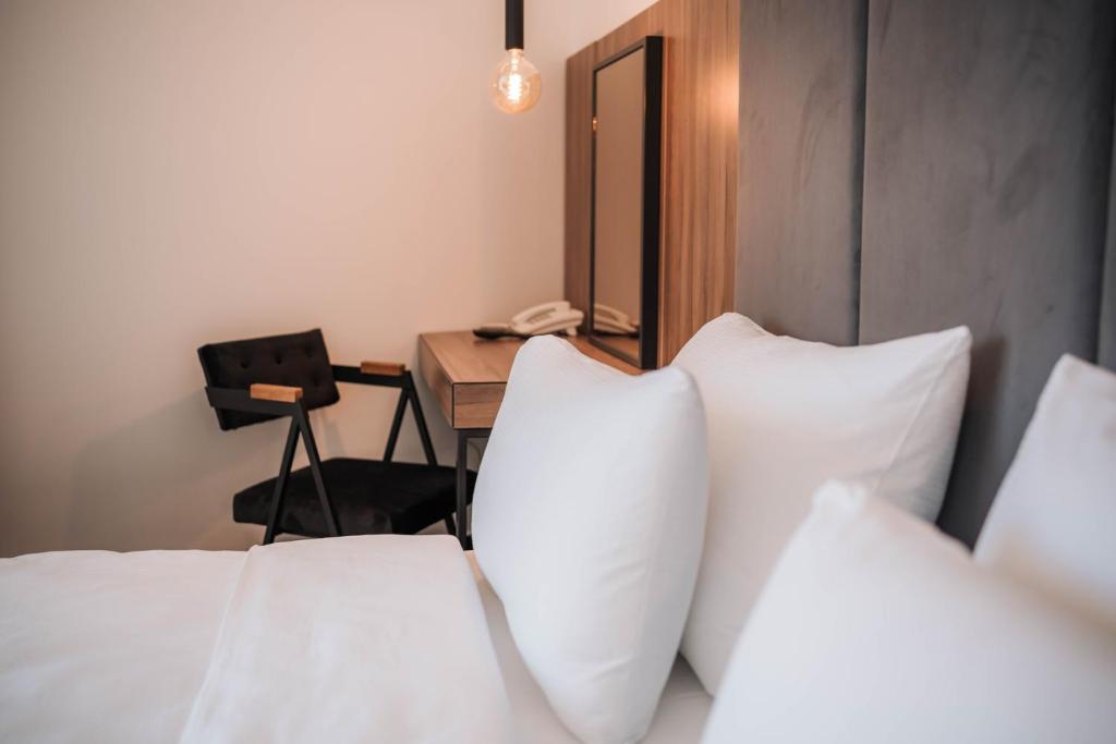 Postel nebo postele na pokoji v ubytování Hotel Carpe Diem