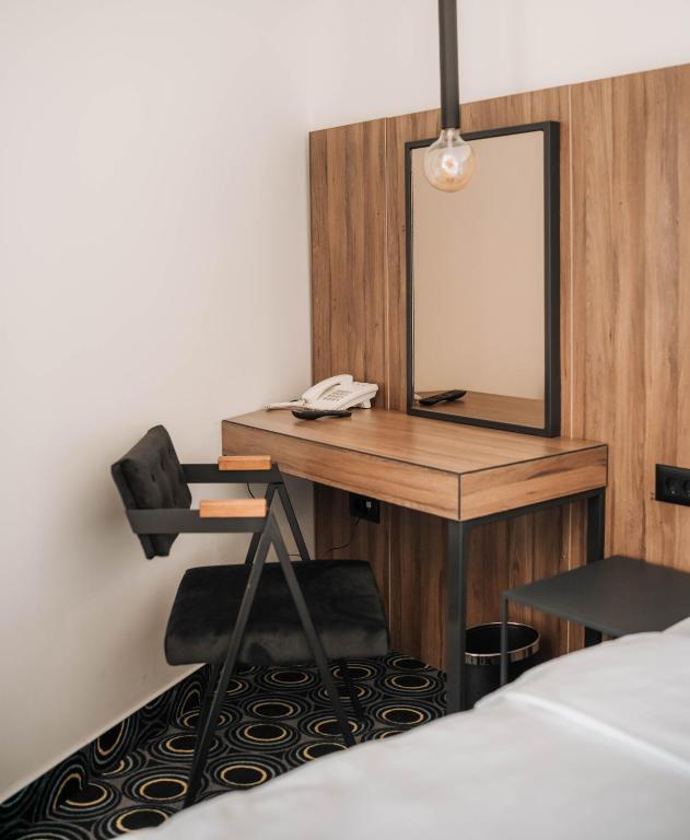 Postel nebo postele na pokoji v ubytování Hotel Carpe Diem
