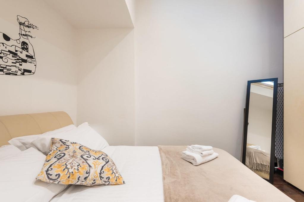 Posteľ alebo postele v izbe v ubytovaní Art Gallery Apartment in Florence