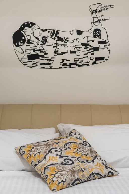 Posteľ alebo postele v izbe v ubytovaní Art Gallery Apartment in Florence