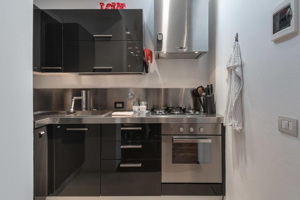 Kuchyňa alebo kuchynka v ubytovaní Art Gallery Apartment in Florence