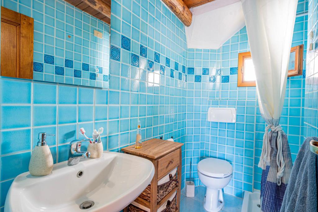 A bathroom at Welcomely- Le Vele