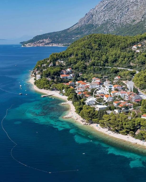 an aerial view of a small island in the ocean at Ge-Ni Mala Duba 86 in Živogošće