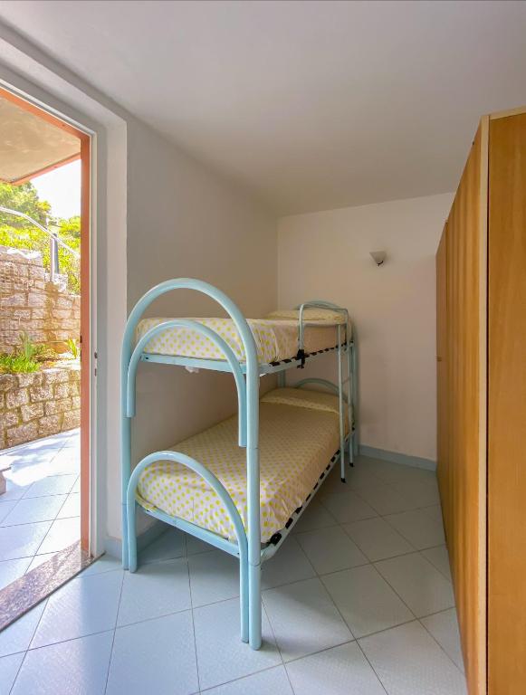 Posteľ alebo postele v izbe v ubytovaní Residence Intur