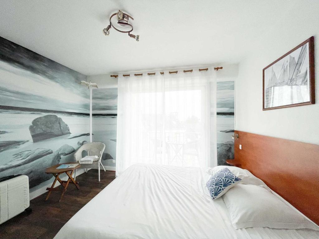 Postel nebo postele na pokoji v ubytování Hotel les Alignements