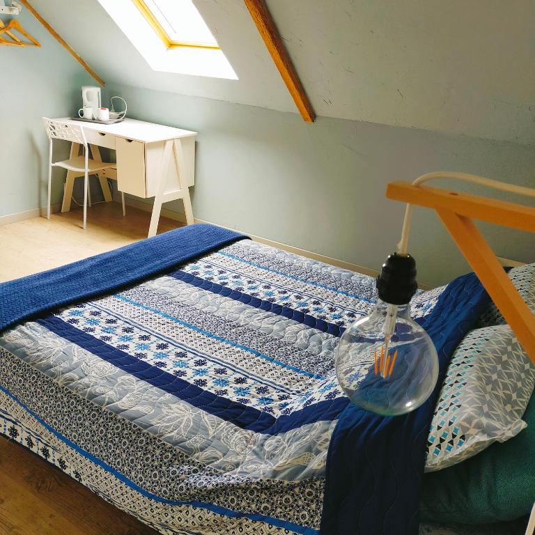 Postel nebo postele na pokoji v ubytování Au Ker Lauriers chambres et table d Hôtes