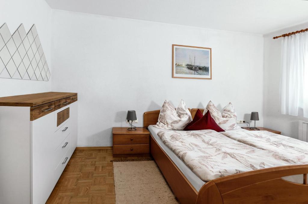Postel nebo postele na pokoji v ubytování Apartment Fritz
