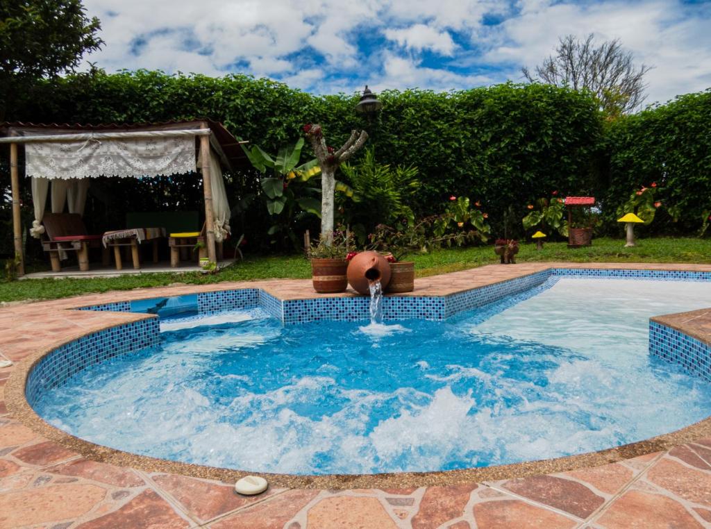 Bazén v ubytování Hotel Campestre Sueño del Abuelo nebo v jeho okolí