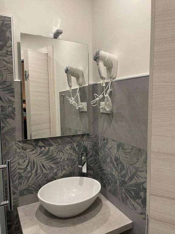 Koupelna v ubytování Domus La Foce Hotel