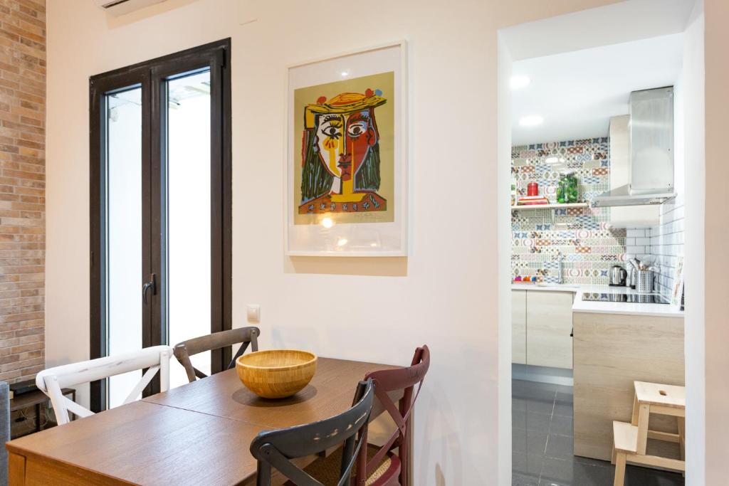 Kuchyň nebo kuchyňský kout v ubytování Stay U-nique Apartments Travessera II