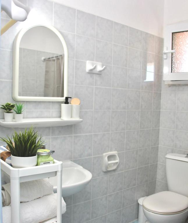 Kúpeľňa v ubytovaní Comfy Loft at Regina Apartments