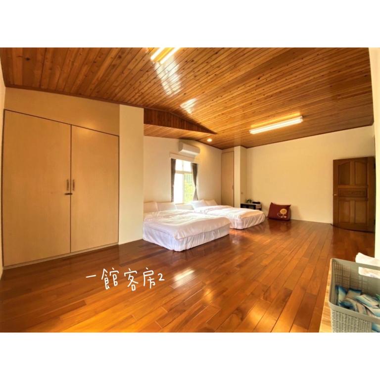 Postel nebo postele na pokoji v ubytování 星森林包棟住宿-台中東勢-山區景觀