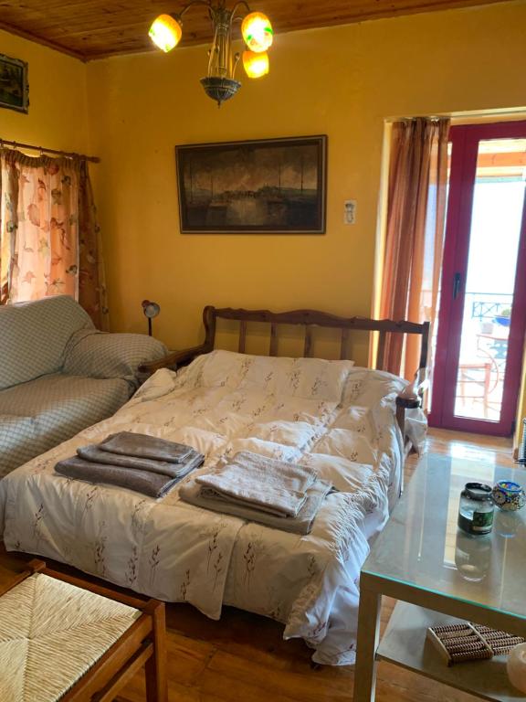 Postel nebo postele na pokoji v ubytování Athena’s House