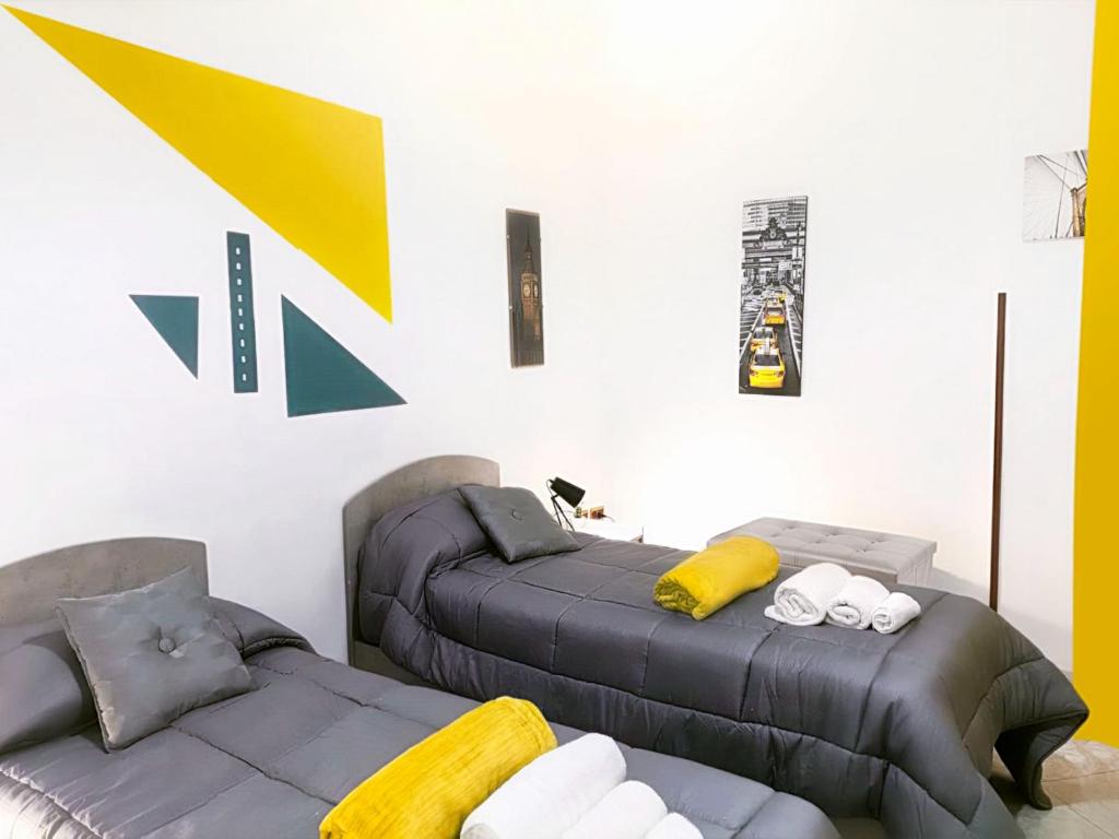 A bed or beds in a room at Gabry central apartment Palermo