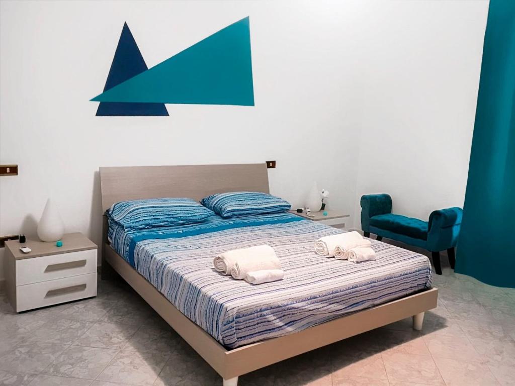 A bed or beds in a room at Gabry central apartment Palermo