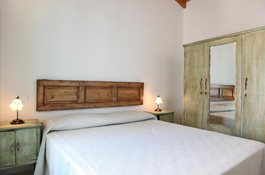 A bed or beds in a room at Dimora Da Tito - La Corte dei Colori