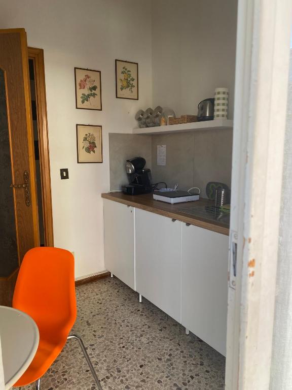 Kuchyň nebo kuchyňský kout v ubytování Affittacamere Room ospedale Maggiore