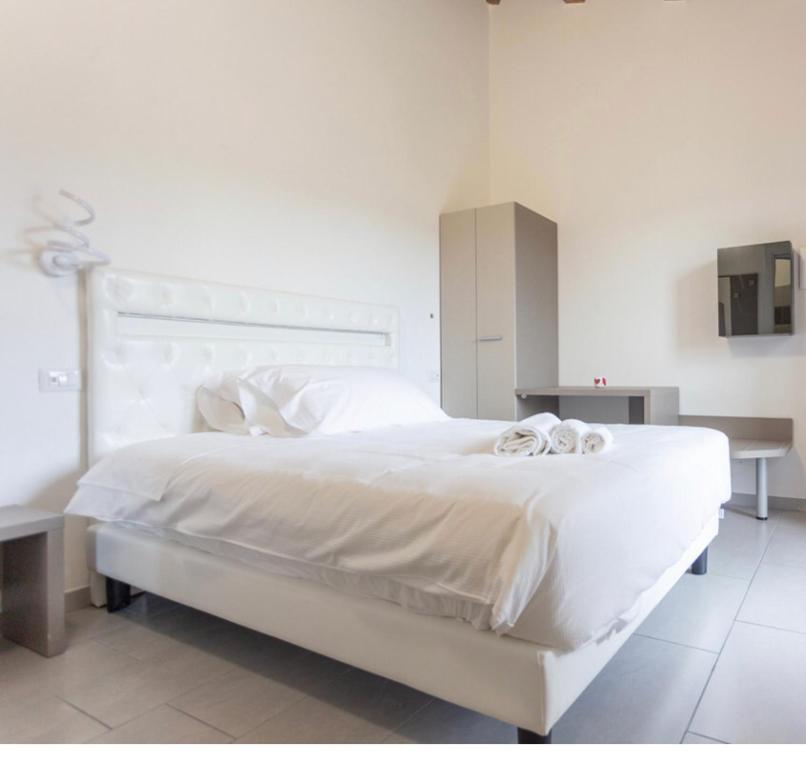 Postel nebo postele na pokoji v ubytování Albergo Diffuso Amatrice