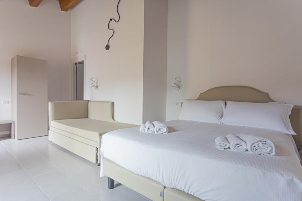 Postel nebo postele na pokoji v ubytování Albergo Diffuso Amatrice