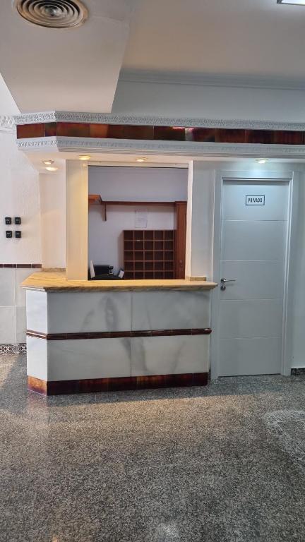 Kuchyň nebo kuchyňský kout v ubytování Hostal Nerjasol