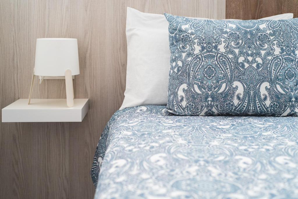 Posteľ alebo postele v izbe v ubytovaní Home2Book Sunny Beach Maspalomas Playa del Inglés