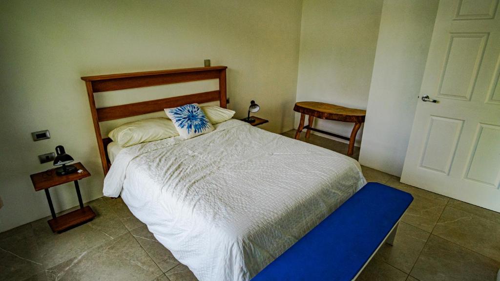 Postel nebo postele na pokoji v ubytování Agutipaca Bungalows