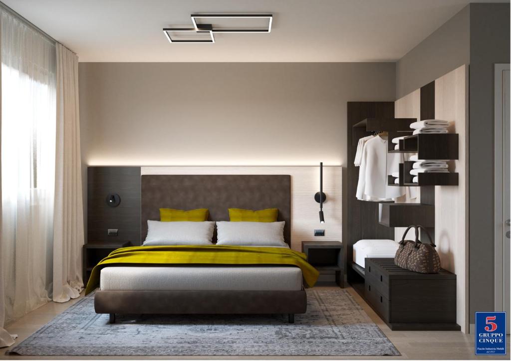 Postel nebo postele na pokoji v ubytování Threeland Hotel