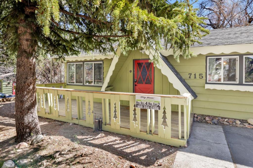 a house with a front porch with a red door at Marin Getaway #2013 by Big Bear Vacations in Big Bear Lake