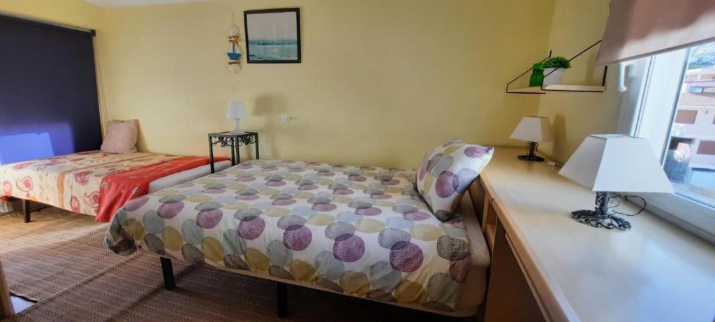 Postel nebo postele na pokoji v ubytování Ático PEÑISCOLA HOME VT-40139-CS ETXIELACASA