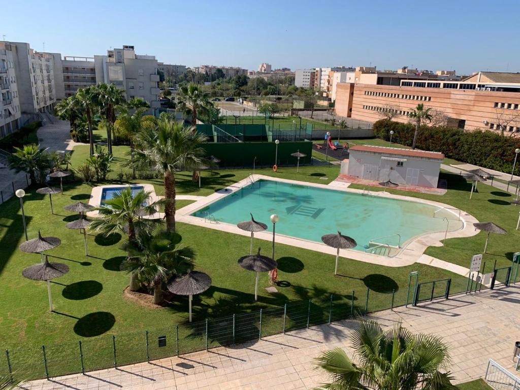 Bazén v ubytování Allo Apartments Europa I Parking Piscina Padel 3 Habitaciones nebo v jeho okolí