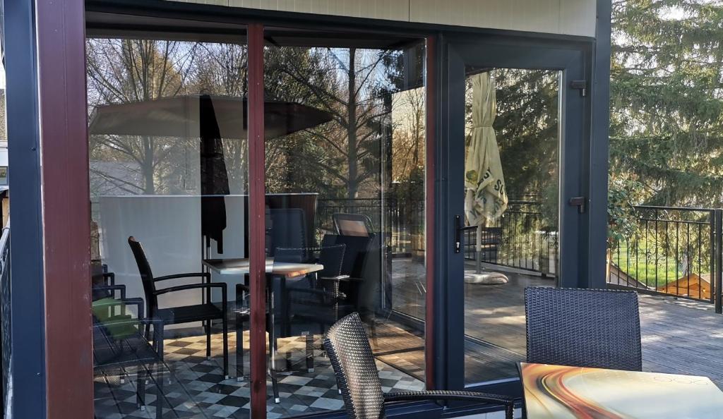Balkón alebo terasa v ubytovaní No Stress Panzió-Pizzéria-Sporttábor