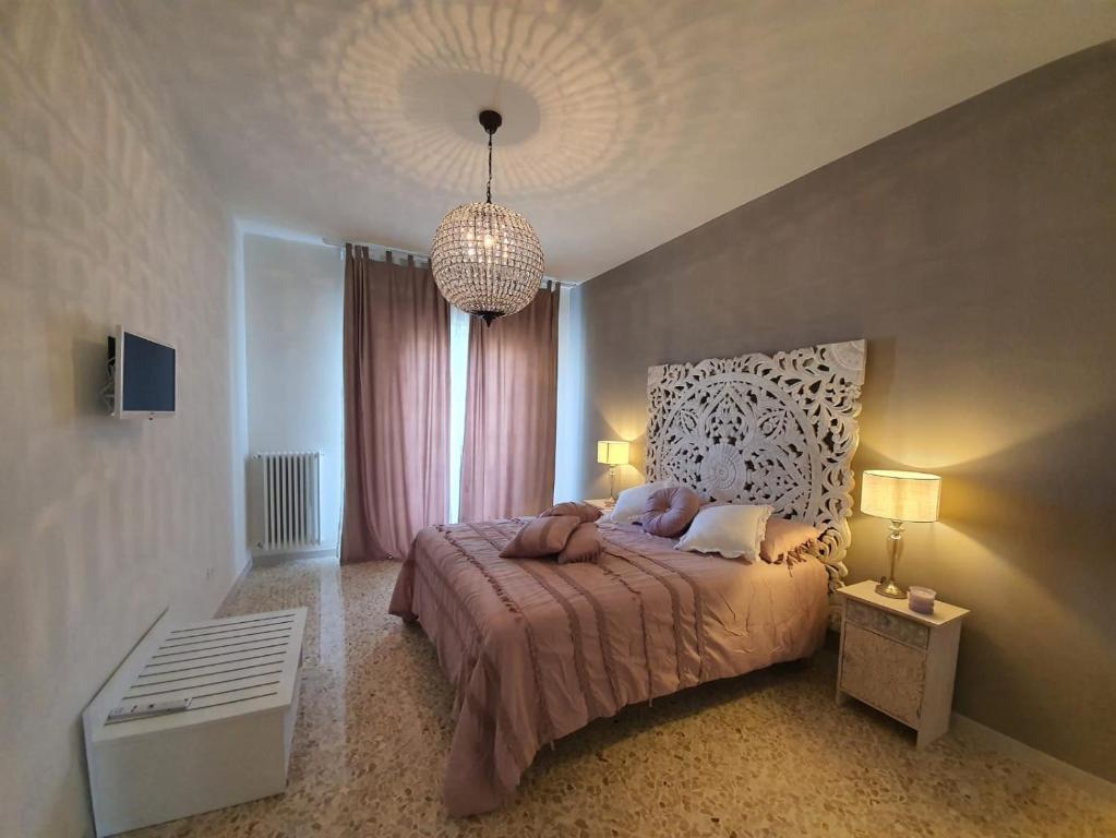 En eller flere senge i et værelse på Maison Borgomare