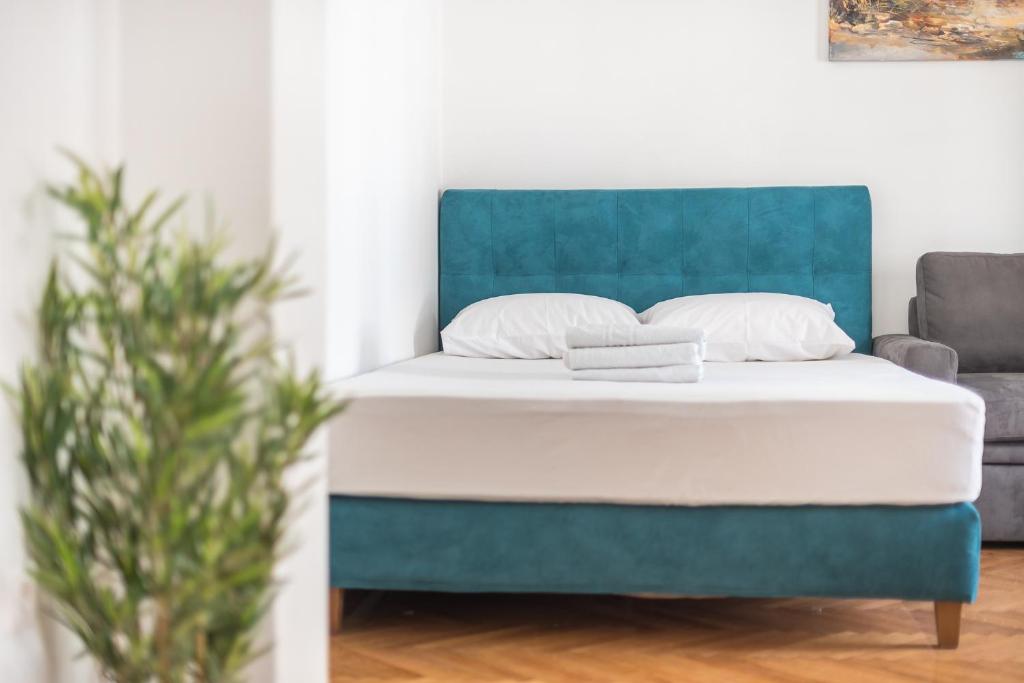 Posteľ alebo postele v izbe v ubytovaní Victoria Sun Apartments