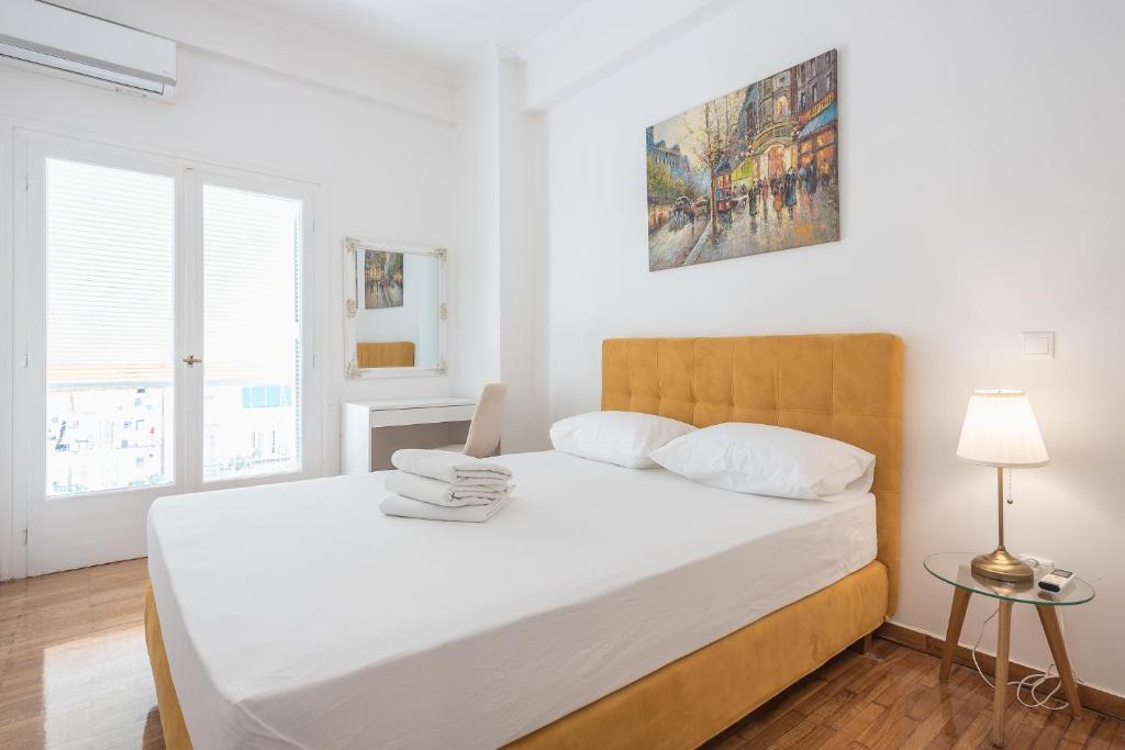 Posteľ alebo postele v izbe v ubytovaní Victoria Sun Apartments